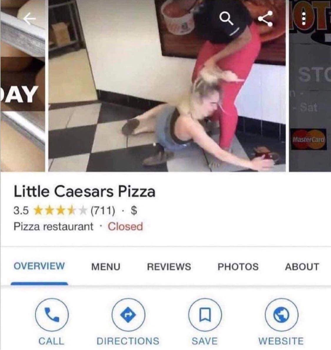 The meme is a screenshot of a Google review for Little Caesars Pizza, where a customer is describing a traumatic experience of being accidentally served a hot pizza by a waitress who slipped on a spill in the kitchen. The review text is not visible, but the image shows a waitress slipping and falling on a pizza, with a customer in the background looking shocked.