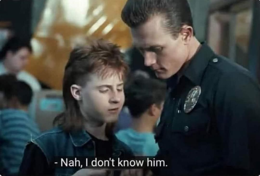 This meme is a screenshot from the movie "Bill & Ted's Excellent Adventure" where a police officer asks a young Bill if he knows a historical figure. The image shows the officer's response, "Inconceivable!" which is a humorous way of saying "I don't know."