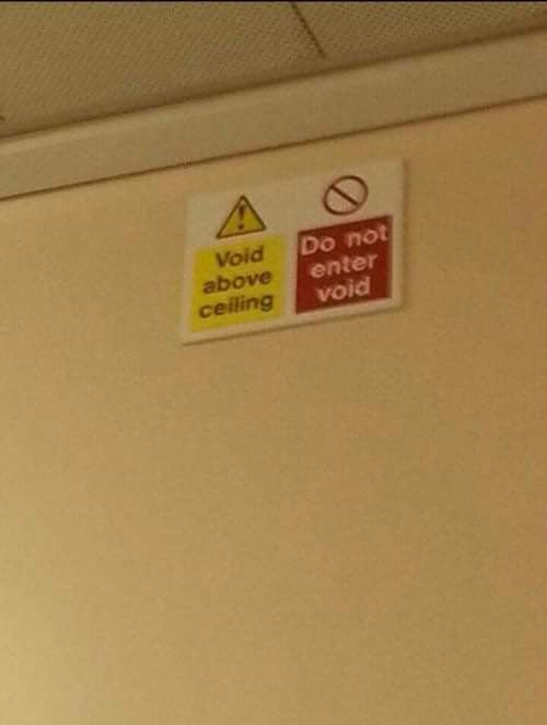 The meme is a humorous image of a sign typically found in public restrooms, specifically in the area above the toilet. The sign reads "Void above ceiling" and "Do not enter void". The humor comes from the absurdity of a sign that's already above the ceiling, so it's impossible to enter it.