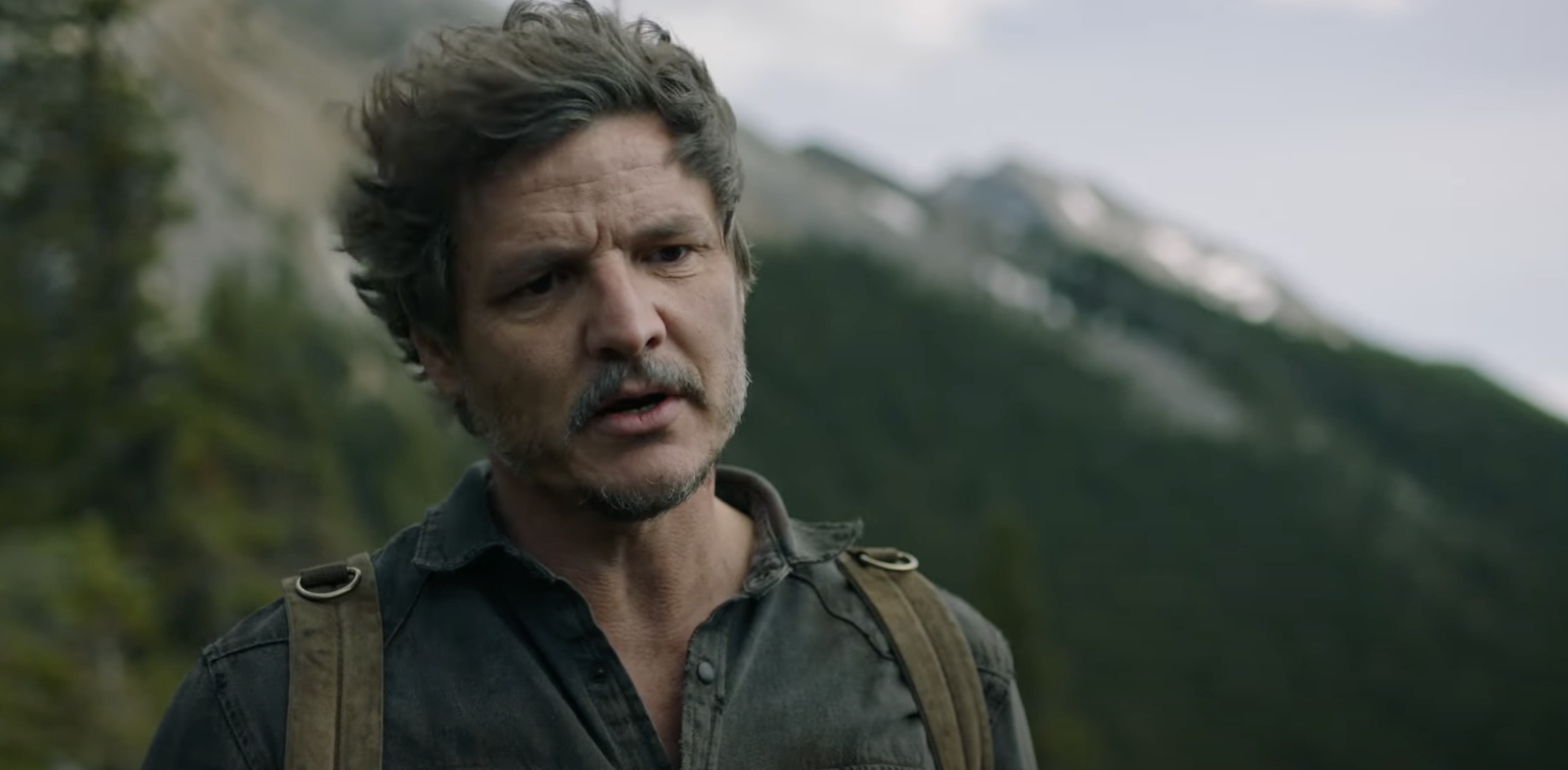 This meme is a still image from the TV show "The Last of Us" featuring Pedro Pascal as Joel. The image shows Joel looking tired and worn out, with a hint of a sarcastic expression. The text "I'm still hungry" is overlaid on the image, implying that Joel's exhaustion is not just physical, but also emotional.