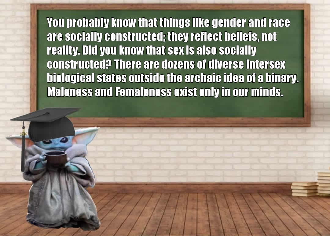 This meme features a cartoon character from the Star Wars franchise, Grogu (also known as Baby Yoda), sitting at a desk with a graduation cap and diploma. The text above the image reads: "I studied intersex biology in secret because I knew if I told anyone I'd be forced to attend 'I'm a Woman Now' therapy sessions."