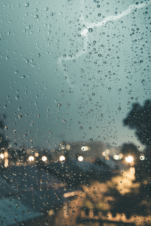 This meme is an image of a rainy day with a caption that reads "when you're stuck inside and the rain makes you feel better". The image is likely a photo of a rainy street or a window with raindrops on it, and the caption is a relatable sentiment that many people can identify with.