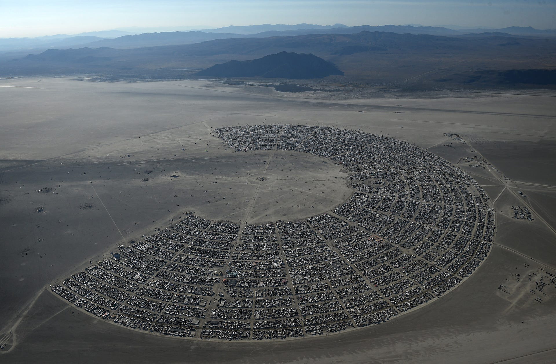 The meme is a screenshot of a Facebook event for Burning Man, a annual festival in the Black Rock Desert, Nevada. The event is titled "Burning Man 2023" and the description reads: "Burning Man is a place for people to explore and express themselves, and to find community and connection with others."
