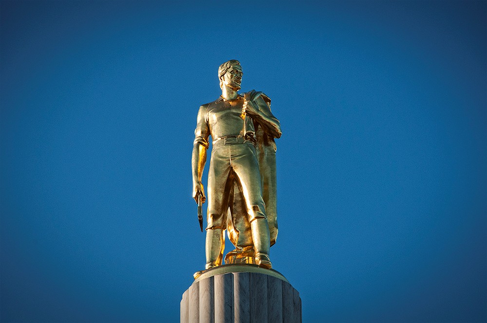 This meme is an image of the iconic "Man on the Moon" statue, but with a twist: the statue's face has been Photoshopped to look like a meme of a man with a concerned or worried expression. The image is captioned "When you realize you're still paying off student loans 10 years after graduation".