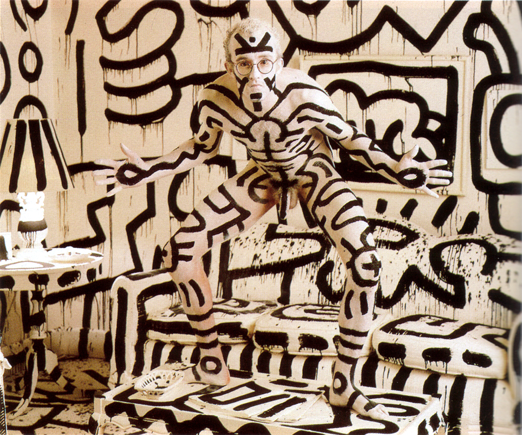 This meme is an image of a person standing in a room that has been completely covered in graffiti, with the words "I CAN SEE FOR MILES" spray-painted in bold letters on the walls. The image is a reference to a song by The Who, but the context is actually a humorous take on the idea of being overwhelmed by a situation. The text in the image reads "I can see for miles, and the rest of the world looks like it's about to end".