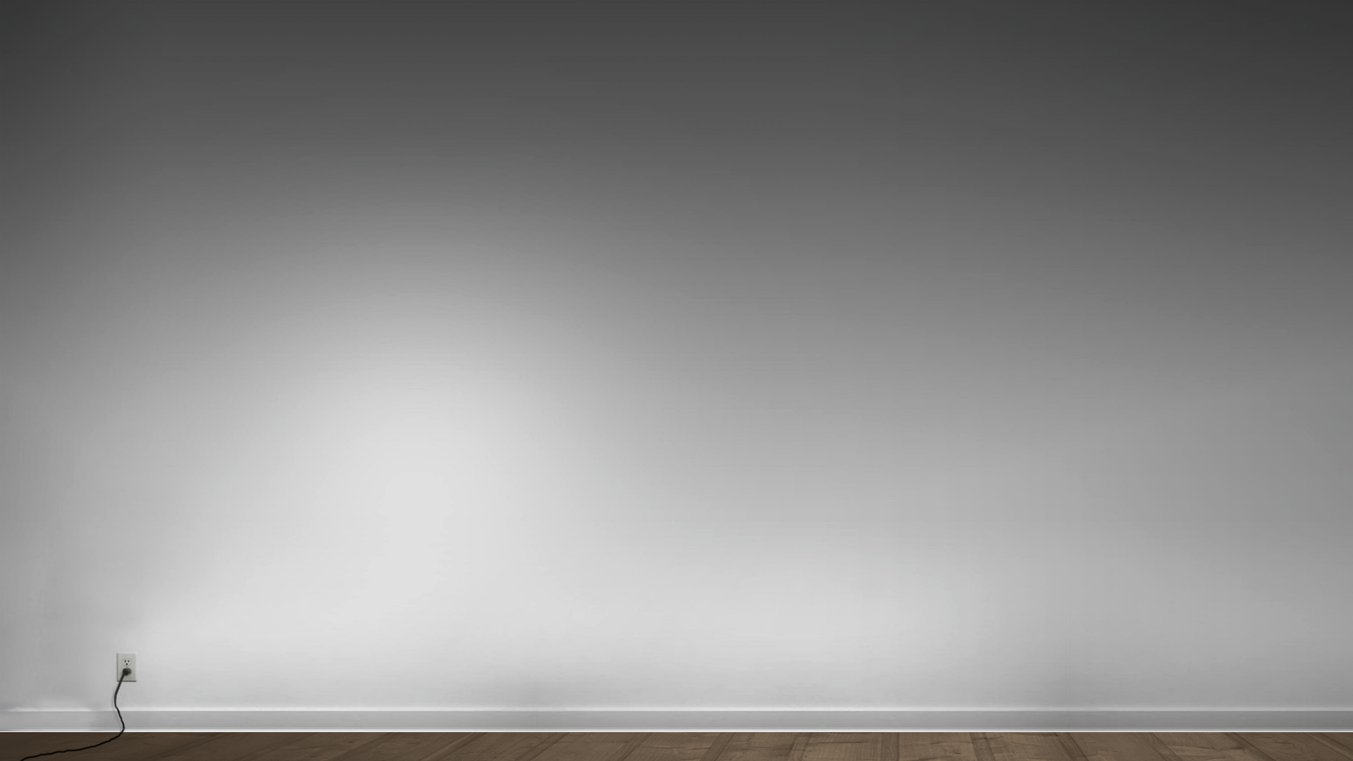 The meme is a picture of a dark room with a single light bulb. There is no text in the image, but the implication is that the light bulb is the only source of illumination in the room, making it the only thing that's "on" in a world that's otherwise "off".