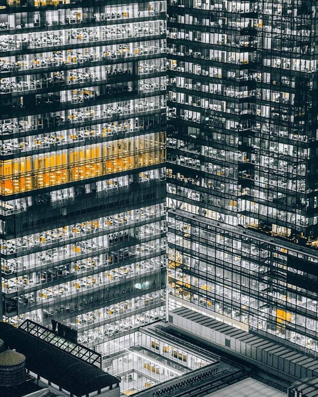 The meme is an image of a crowded office building with many employees working at their desks. The text "We've been working remotely for 3 years" appears above the image, implying that the building is now empty due to the shift to remote work. The image is humorous because it shows a massive, empty office building that was previously bustling with employees.