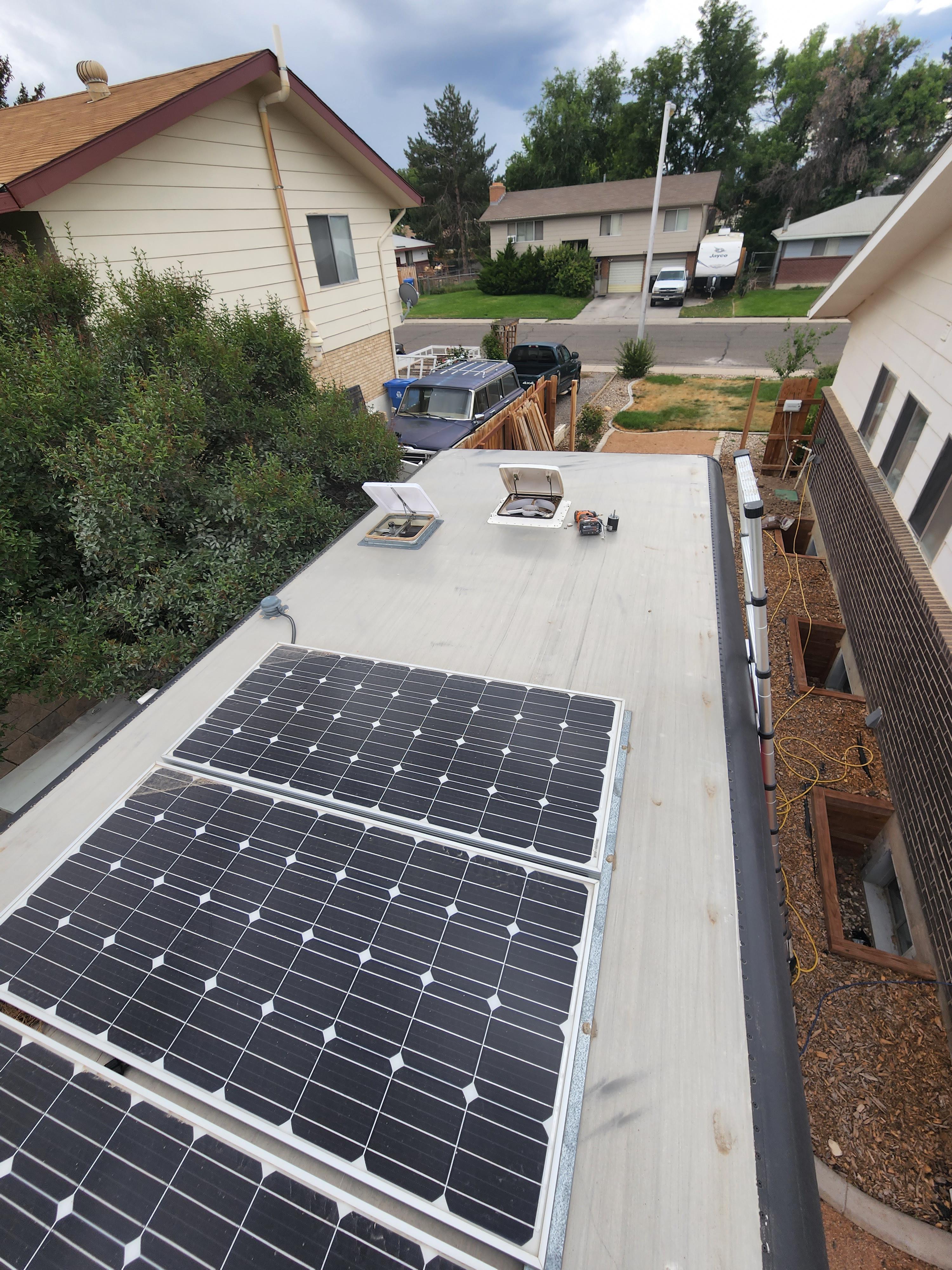 The meme is an image of a house with a solar panel roof, but the panels are actually a giant game of "Jenga" with blocks that are precariously stacked on top of each other. The text "permaculture" is written in a play...