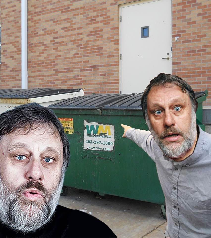 The meme is a photo of Slavoj Žižek, a philosopher known for his provocative and humorous commentary on modern society. In the image, Žižek is standing in front of a dumpster with a trash can behind him, and he's poin...