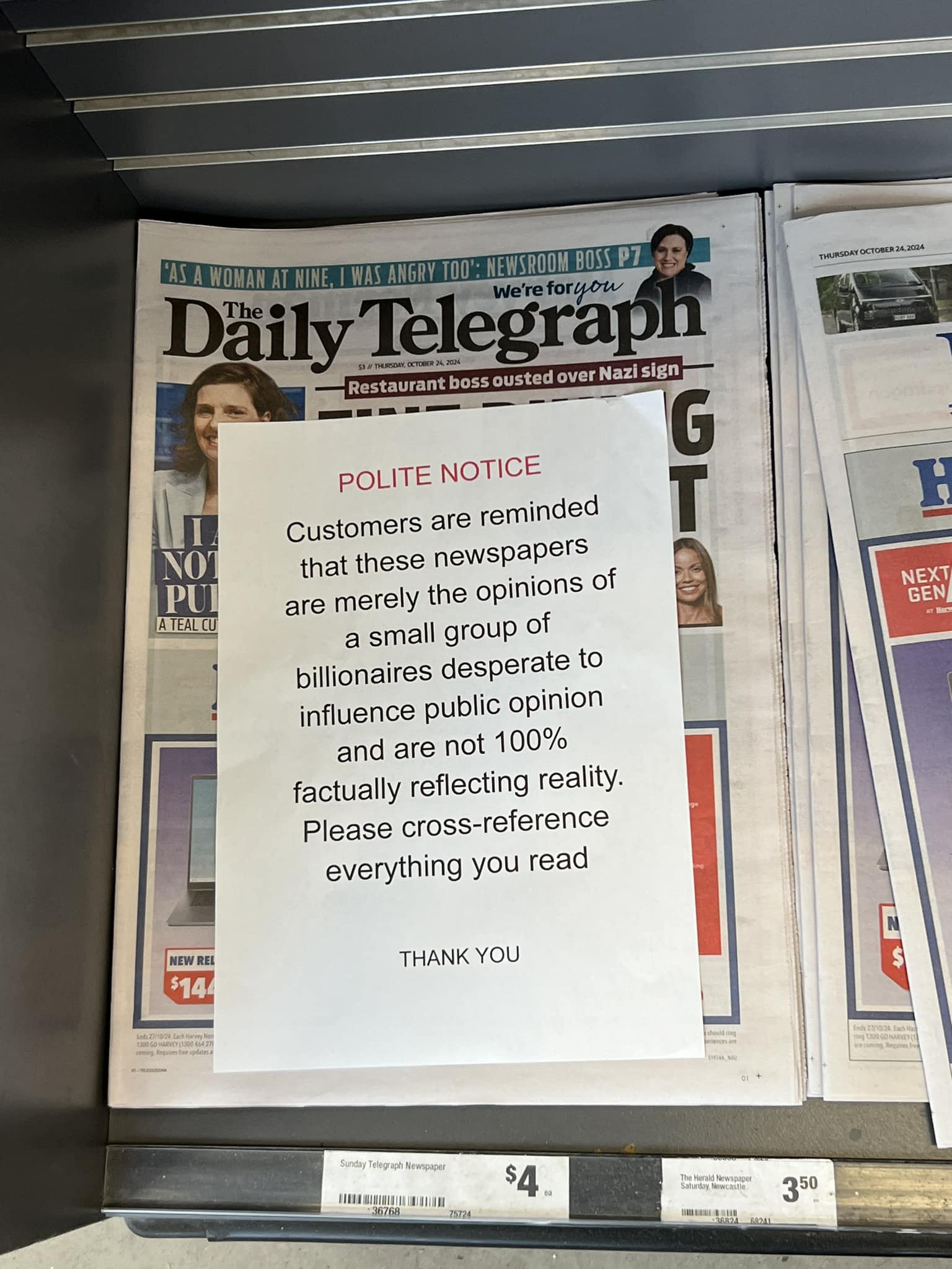 The meme is a screenshot of a newspaper headline with a bolded, red "NOT" preceding the title, making it clear that the opposite of the statement is true. The headline reads: "The Daily Telegraph: NOT A Reliable Source of News". The image is accompanied by a caption, "The Daily Telegraph: NOT A Reliable Source of News".
