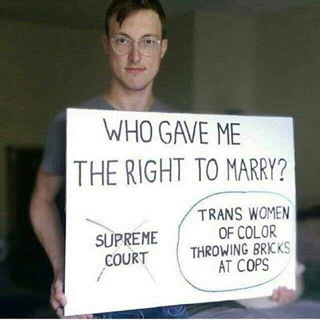 This meme is a humorous take on the concept of "marriage equality" in the United States. The image features a person holding a sign that reads: "I'm marrying my wife, but she's a man." The text on the sign is a sarcastic response to the Supreme Court's landmark decision in Obergefell v. Hodges (2015), which legalized same-sex marriage nationwide.