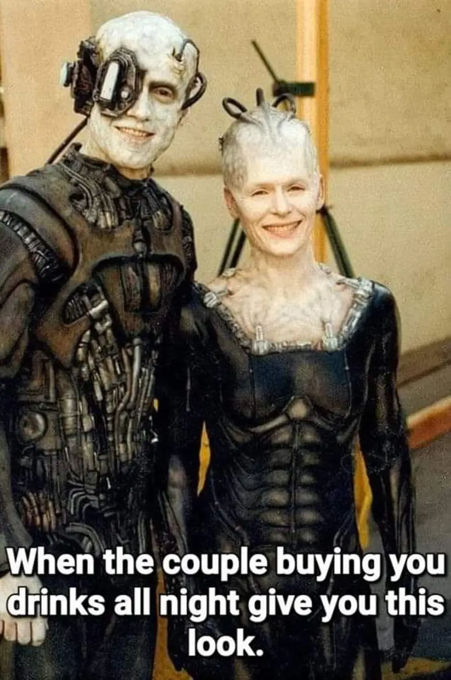 This meme is a humorous image of two characters from the Star Trek: The Next Generation series, the Borg, with a caption that implies they are enjoying a romantic evening with their significant other. The caption reads: "When the Borg from Star Trek: The Next Generation finally get to enjoy a romantic evening with their partner and they're both pleased with the outcome."