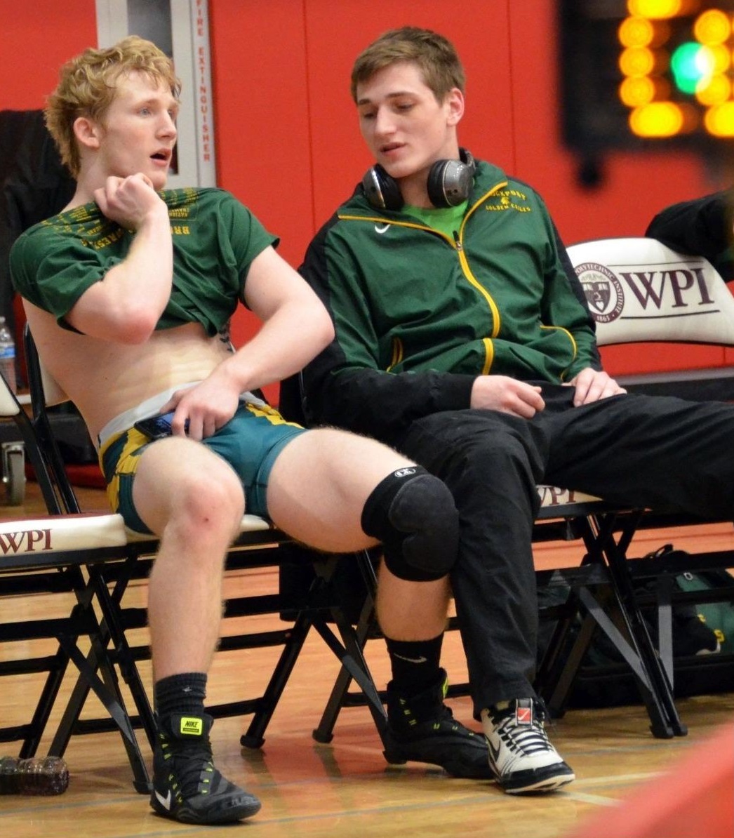 The meme is a photo of two men, one wearing a wrestling singlet and the other in a referee's uniform, with the caption "I'm not gay, I just love wrestling". The image is humorous because it pokes fun at the stereotype...