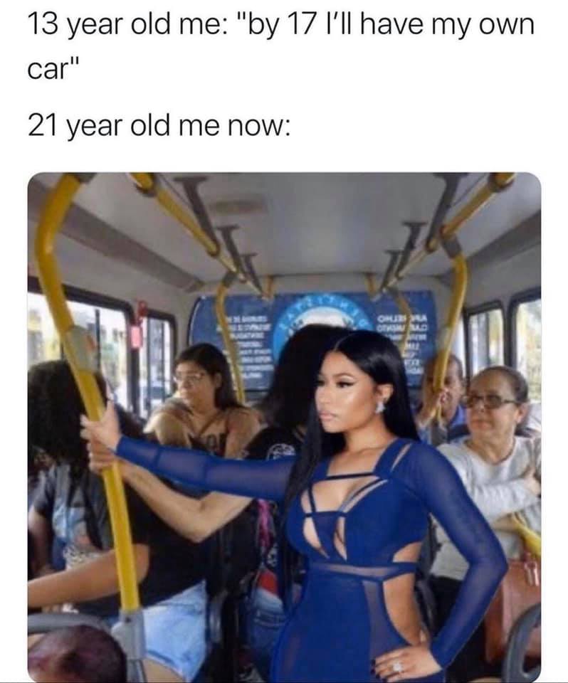 This meme is a humorous comparison between the idealistic expectations of youth and the harsh realities of adulthood. The image shows a young woman in a provocative outfit, likely a pop star or celebrity, with the caption "13 year old me: I'm gonna be a pop star by 20" and "20 year old me: I'll just get a 9-5 and be miserable". The meme pokes fun at the idea that as we get older, our ambitions and expectations often give way to more mundane and practical realities.