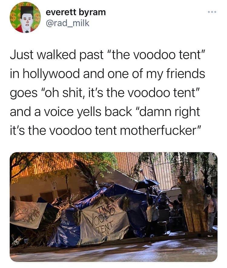 This meme is a play on the idea of a "voodoo" or "juju" curse, but with a humorous twist. The image shows a person walking down the street, and the text "I told you I didn't invite you" is written on a sign on the gro...